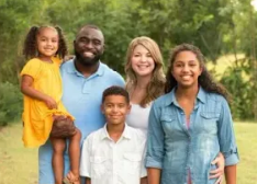 Mixed family spending time together